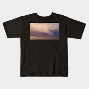 Colorful stormy sky over the ocean Kids T-Shirt